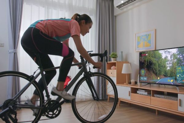 Training indoors on a smart trainer following a training plan by Consummate Athlete that can be used on Zwift or Garmin.