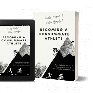 Image of a book titled "Becoming a Consummate Athlete" by Molly Hurford and Peter Glassford, alongside a tablet displaying the book's cover. The cover features illustrations of cyclists and runners on a mountainous landscape.