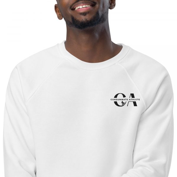A person wearing a white sweatshirt with a logo on the left chest that says "CONSULTMATE ATHLETE" along with a stylized "CA" and a small graphic. The person is smiling and only their upper torso and face are visible.